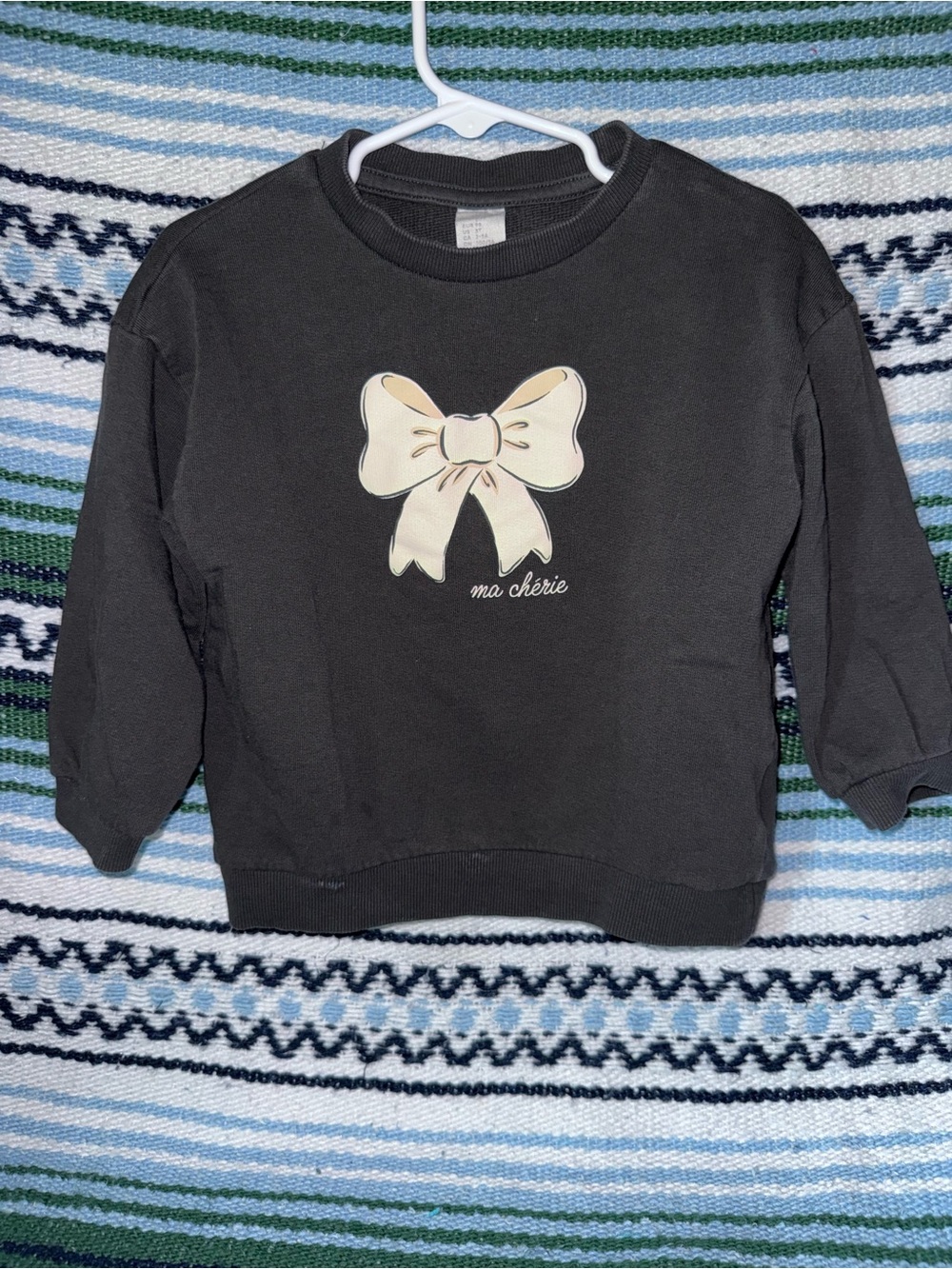 H&M Black Sweatshirt with Cream Bow Graphic
